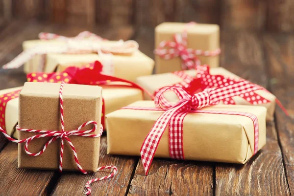 Boxes for presents with colorful ribbons — Stock Photo, Image