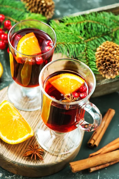 christmas drink with fruits and aroma spices