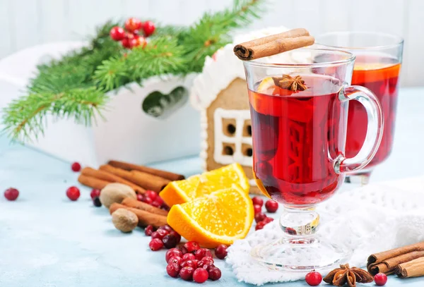 christmas drink with fruits and aroma spices