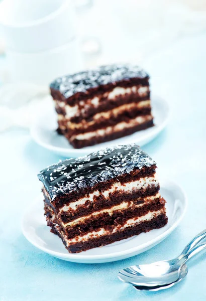 Chocolate cakes on plates — Stock Photo, Image