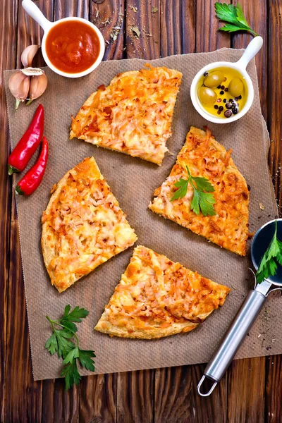 Fresh pizza with aroma spices and cheese — Stock Photo, Image