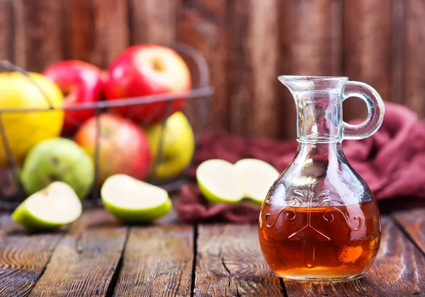 Apples in basket on table — Stock Photo, Image