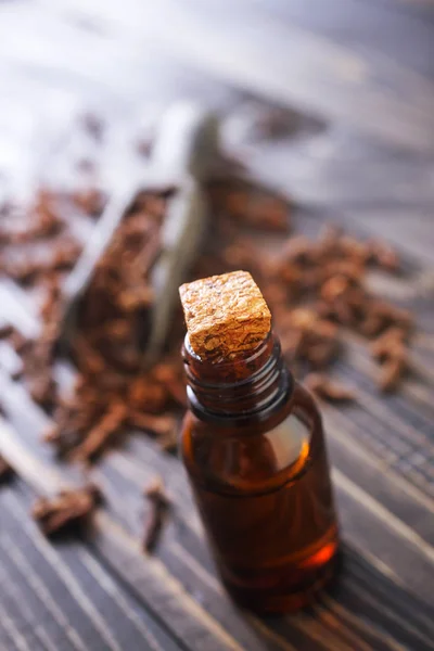 Clove oil in bottle — Stock Photo, Image