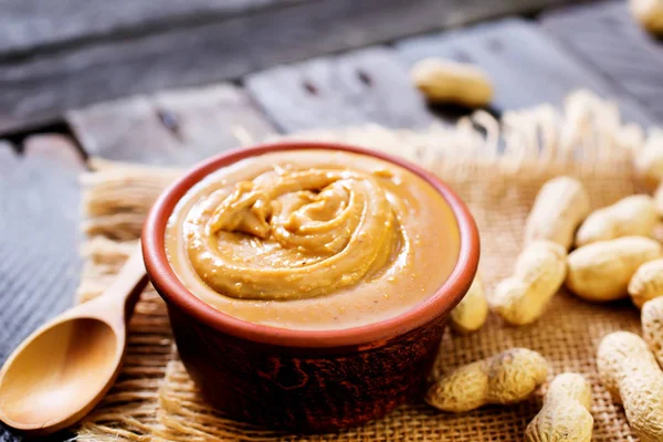 Peanuts butter in bowl — Stock Photo, Image