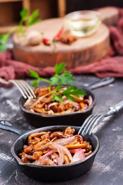 Fried mushrooms in pans — Stock Photo, Image