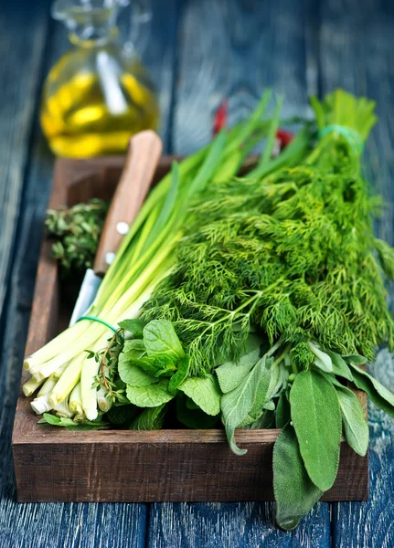 Fresh greens in wooden box — Stock Photo, Image