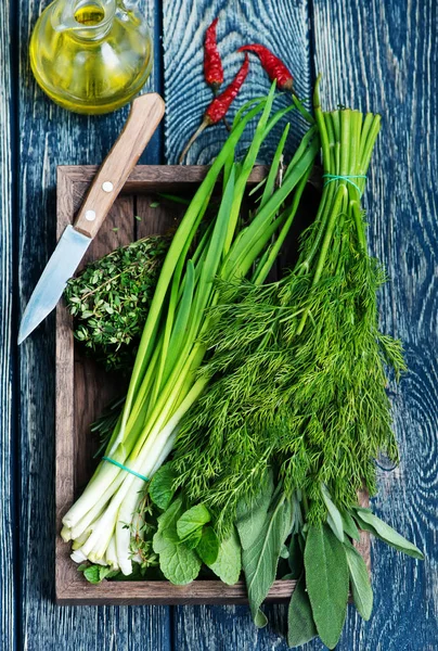 Fresh greens in wooden box — Stock Photo, Image