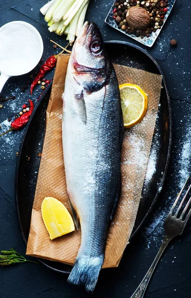 Raw fish with spices — Stock Image Raw fish with spices Royalty Free Stock Images