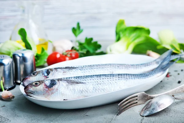Raw fish with spices — Stock Image Raw fish with spices Royalty Free Stock Photos