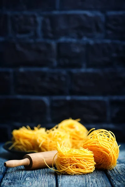 Raw noodles from yolks — Stock Photo, Image