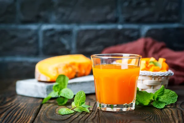 Fresh pumpkin and juice — Stock Photo, Image