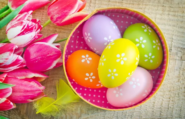 Easter eggs with tulips — Stock Photo, Image