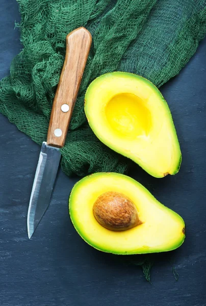 Fresh avocados on a table — Stock Photo, Image