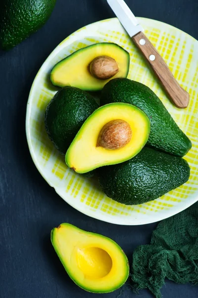 Fresh avocados on a table — Stock Photo, Image