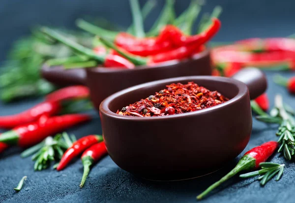 Chiles en la mesa negra , — Foto de Stock