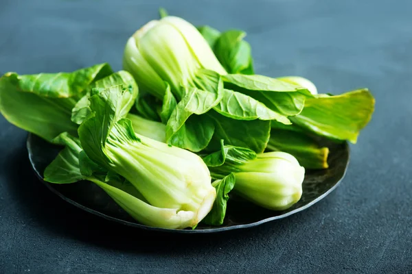 Fresh pak choi on plate — Stock Photo, Image