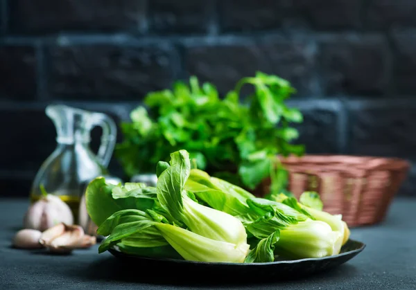 Fresh pak choi on plate — Stock Photo, Image