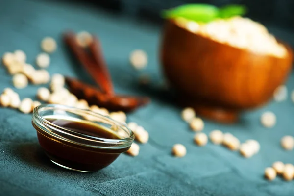 Soy sauce in glass bowl — Stock Photo, Image