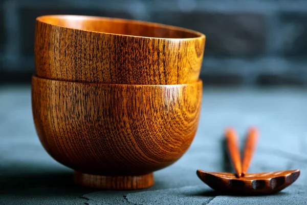 Wood bowls with wooden chopsticks — Stock Photo, Image