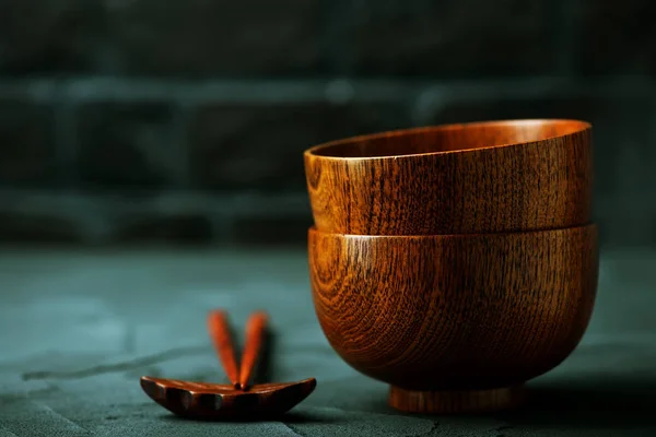 Wood bowls with wooden chopsticks — Stock Photo, Image