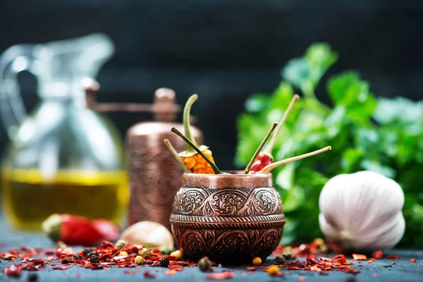 Spices and aroma oil — Stock Photo, Image