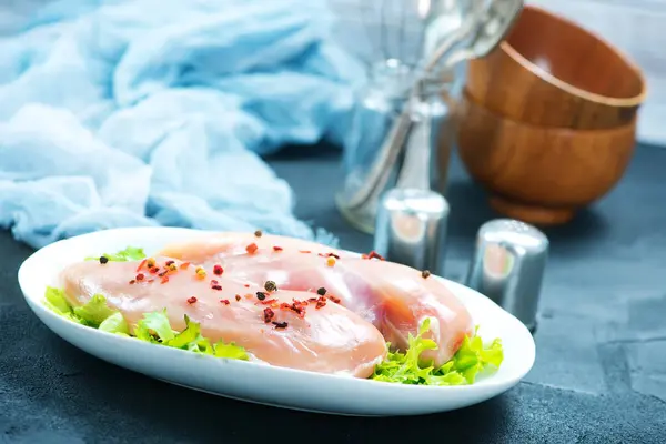 Raw chicken fillets  on the plate — Stock Photo, Image