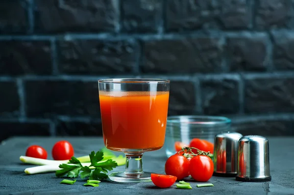 Tomato juice in glass — Stock Photo, Image