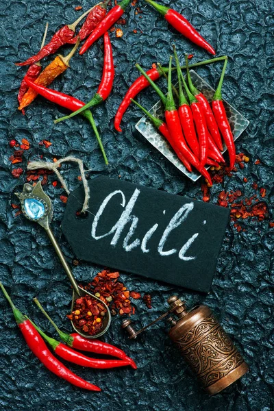 Chili peppers on table — Stock Photo, Image