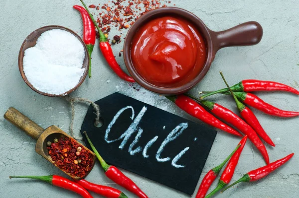 Chilli sauce and aroma spices — Stock Photo, Image
