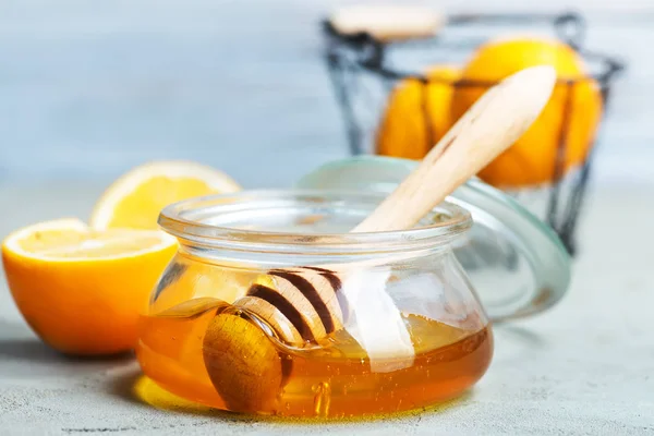 Honey in glass jar — Stock Photo, Image