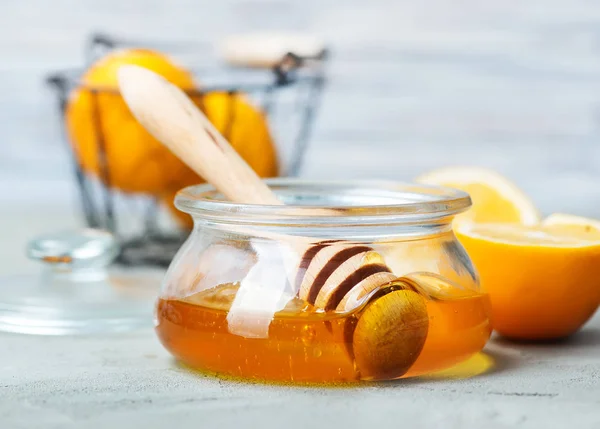 Honning i glas krukke - Stock-foto
