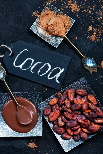 Composition with cocoa beans — Stock Photo, Image