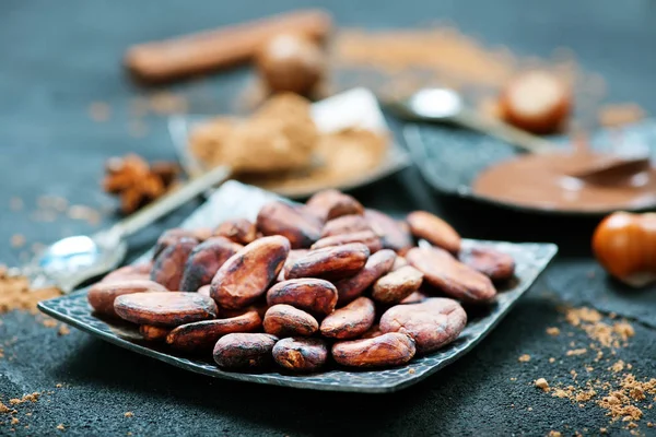 Composition with cocoa beans — Stock Photo, Image