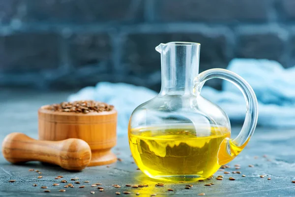 Flax seeds and oil — Stock Photo, Image