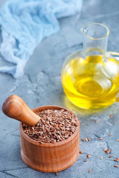 Flax seeds and oil — Stock Photo, Image