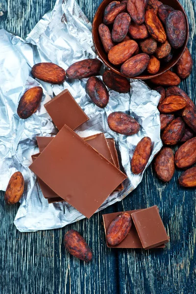 Chocolate and aroma spices — Stock Photo, Image