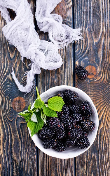 Blackberries in white bowl — Stock Photo, Image