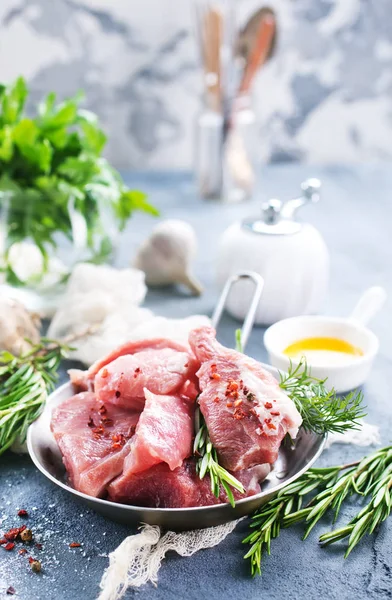 Raw meat with oil — Stock Photo, Image