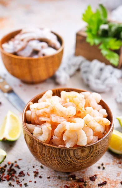 Fresh seafood in bowls — Stock Photo, Image