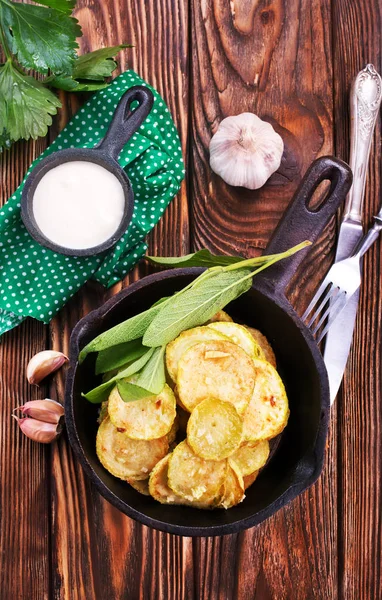 Fried zucchini in pan — Stock Photo, Image