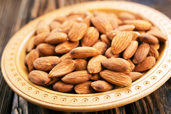 Fried almond on plate — Stock Photo, Image