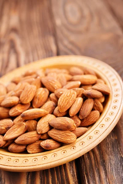 Fried almond on plate — Stock Photo, Image