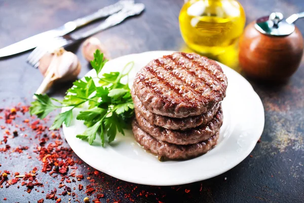 Gebakken schnitzels voor Hamburger — Stockfoto