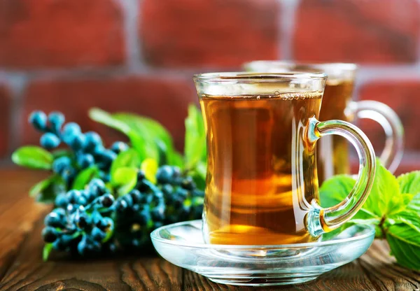 Pobočka borůvky s čajem — Stock fotografie