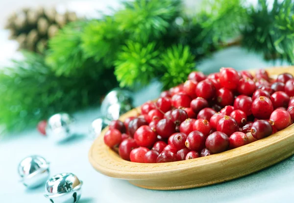 Cranberries with Christmas decoration — Stock Photo, Image