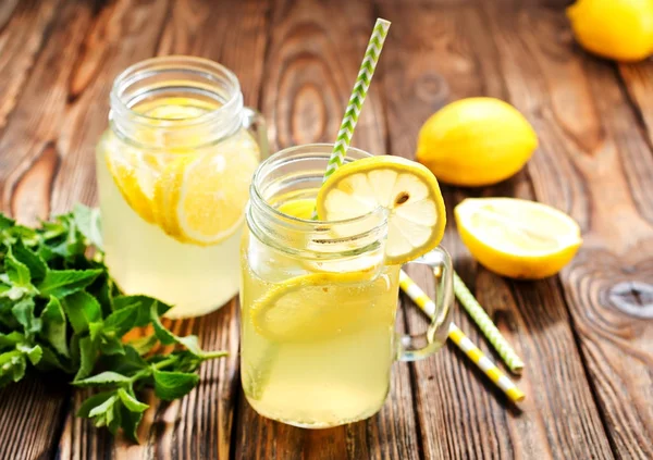 Lemonade in glass jars — Stock Photo, Image