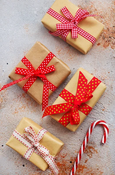 Gift boxes and candy cane — Stock Photo, Image