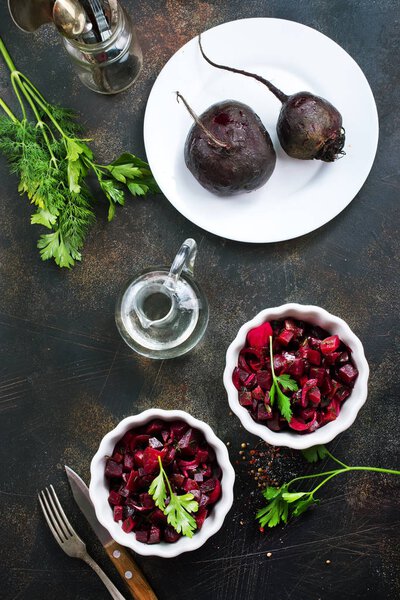 salad with boiled beet in the bowls