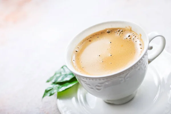 Hot coffee in white cup — Stock Photo, Image