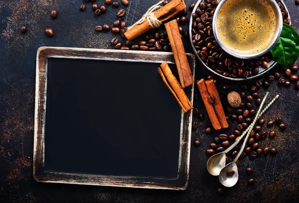 Hot coffee and black board — Stock Photo, Image